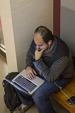 photo of a student using a laptop