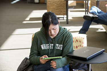 photo of a student using a tablet