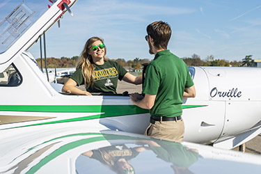 photo of a student and instructor at first flight