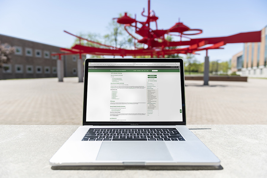 photo of a laptop with a CaTS webpage