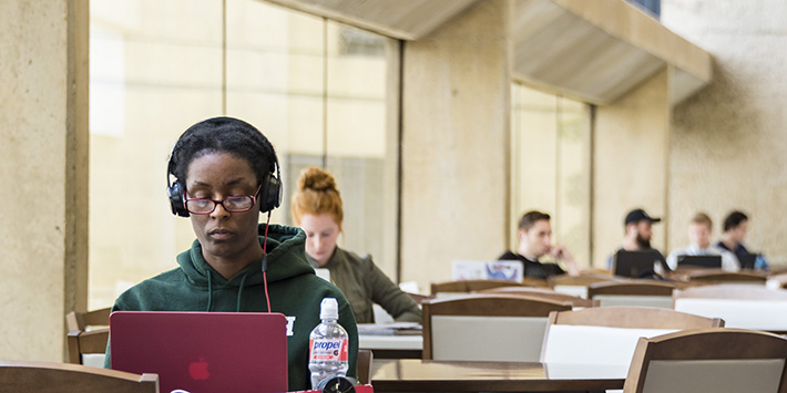 photo of students studying in the library