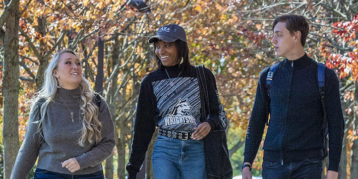 photo of students walking outside on campus