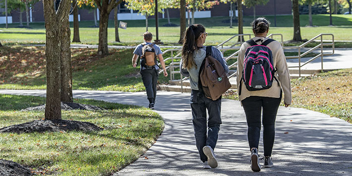 photo of students walking outside on campus