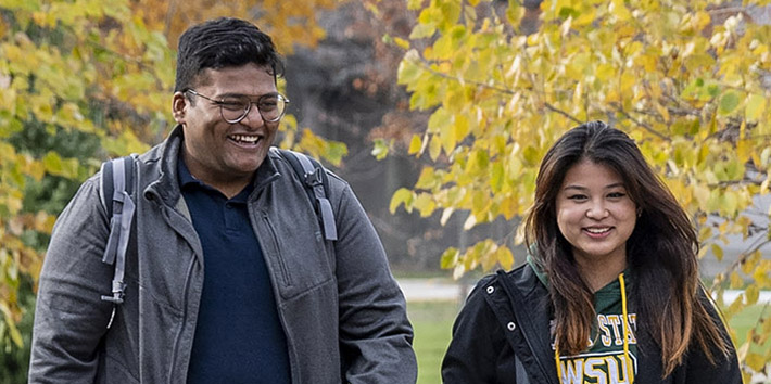 photo of students walking on campus
