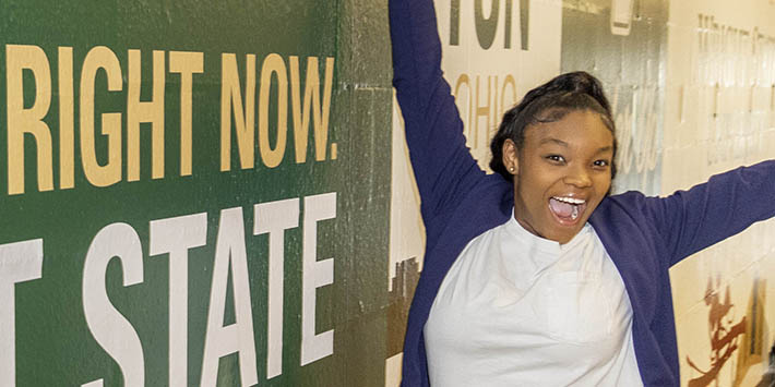 photo of a student posing for a photo in the student union