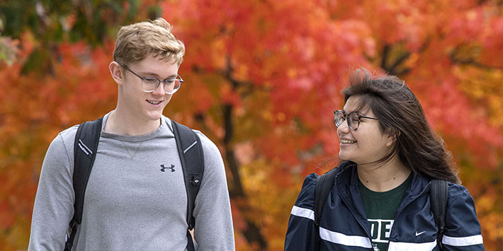 photo of students walking outside on campus