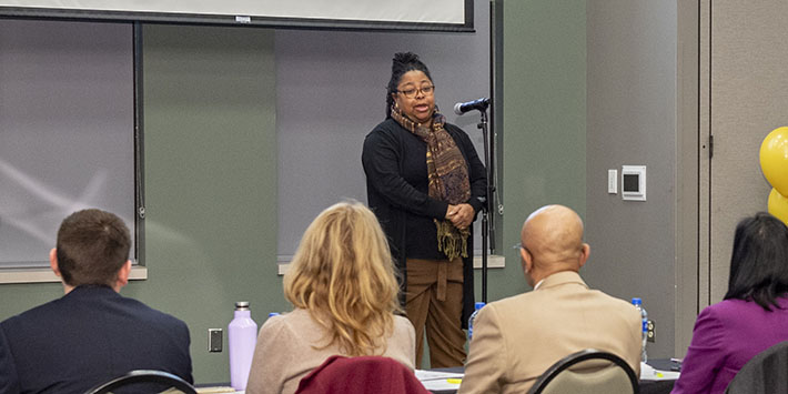 photo of a student speaking at the Three Minute Thesis/Dissertation Competition