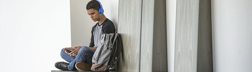 photo of a student looking at a phone