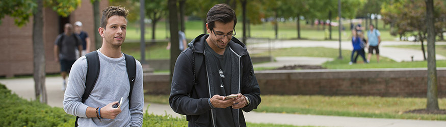 photo of students walking outside on campus