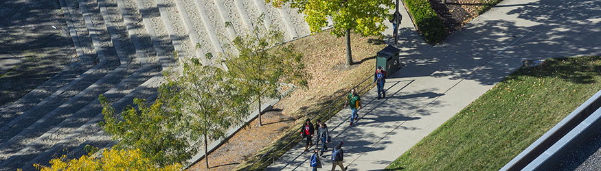 photo of students walking outside on campus