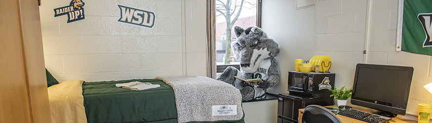 photo of rowdy in a hamilton hall dorm room
