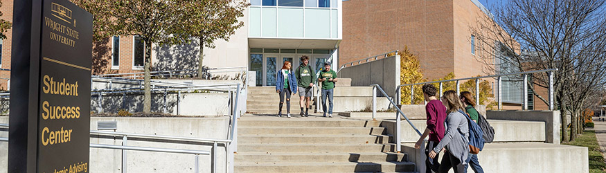photo of students walking in and out of the student success center