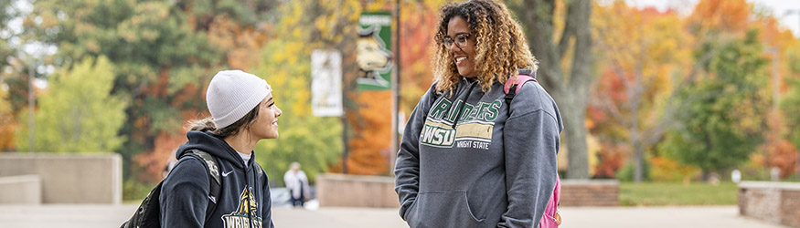photo of students outside on campus 