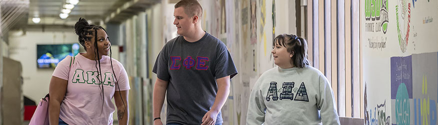 photo of students walking and talking in the tunnels
