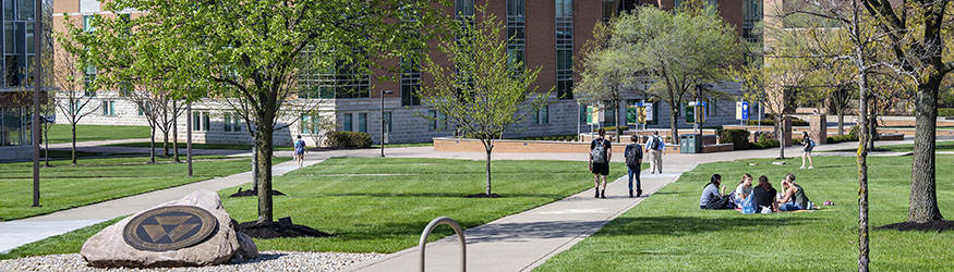 photo of students outside on campus 