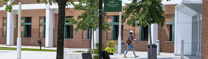 photo of a student walking into the student union