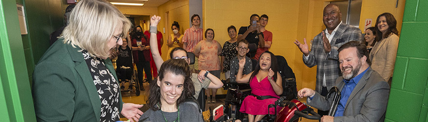photo of students and employees at a grand opening
