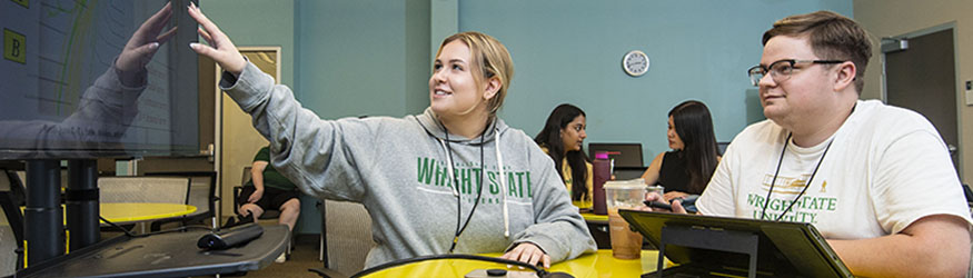 photo of students working together in the student success center