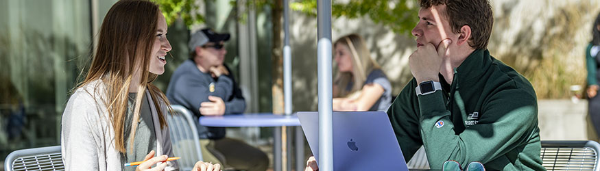 photo of students outside on campus