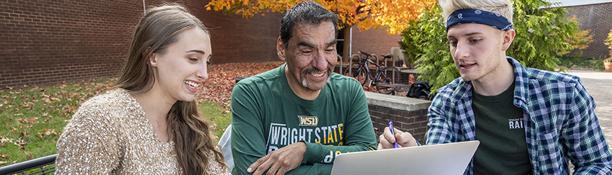 Students working together on a computer