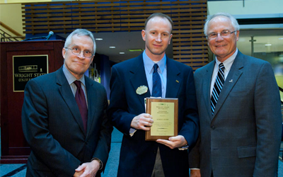 Robert "Bobby" Rubin, a senior lecturer of English and director of the English as a Second Language (ESL) program, receives the 