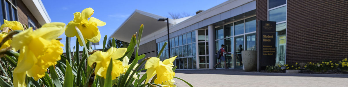 photo of a student walking into the student union