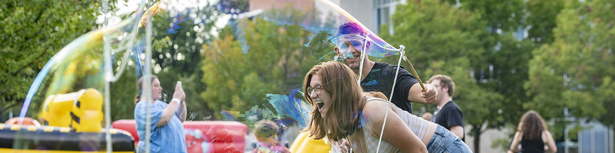photo of students outside on campus