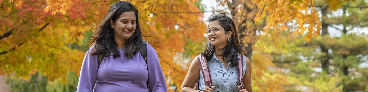 photo of students walking outside on campus