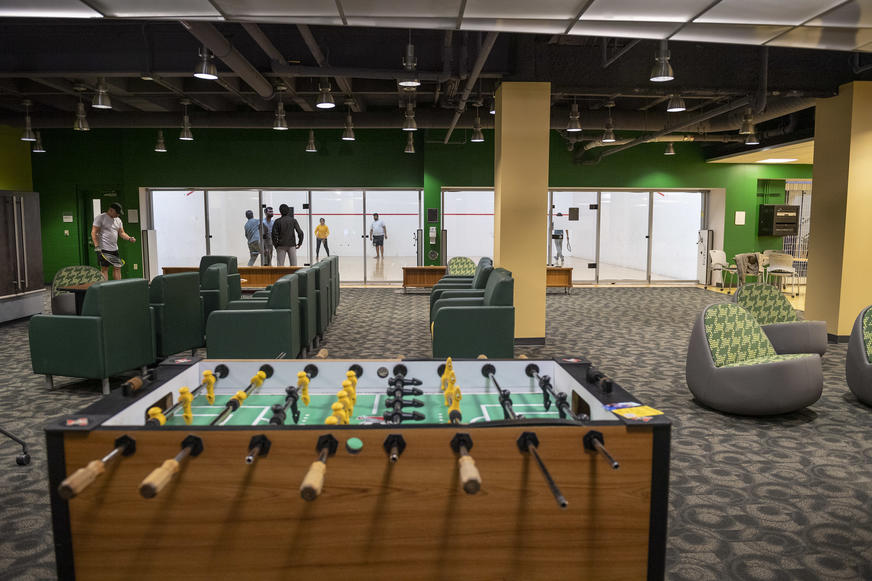photo of people playing racquetball