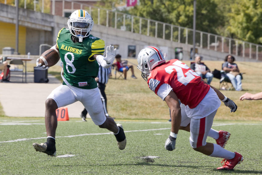 photo of club football in action