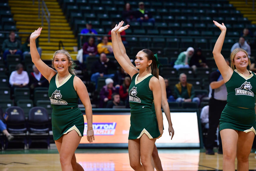 Competitive Cheer waving to crowd