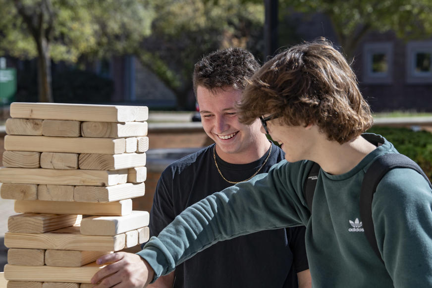 photo of students playing giant jenga