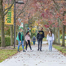 photo of students walking outside on campus