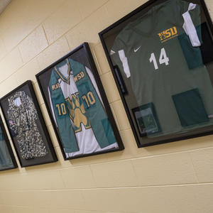 photo of framed intramural sport jerseys in the student union